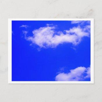 clear blue sky and white clouds postcard